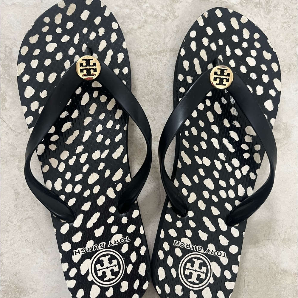 Tory Burch flip flops size 9.